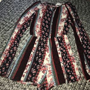 This is a dark floral romper